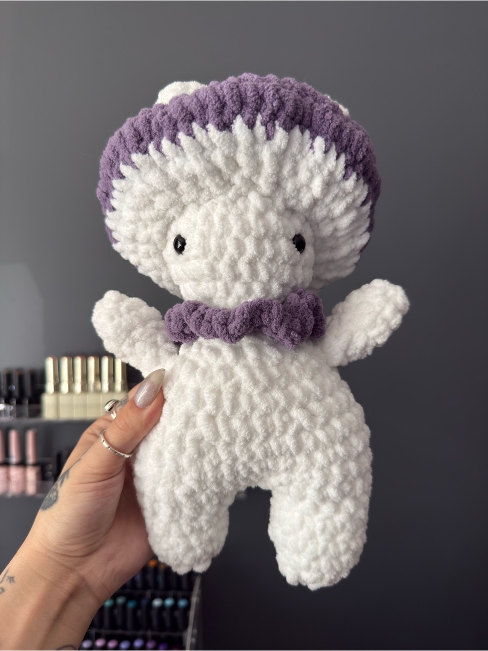 crocheted purple mushroom guy